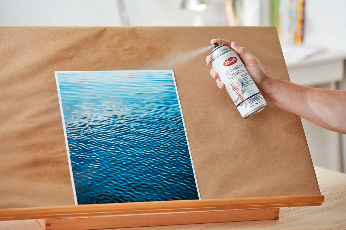 Applying Krylon UV-Resistant Clear Coating gloss spray to a project