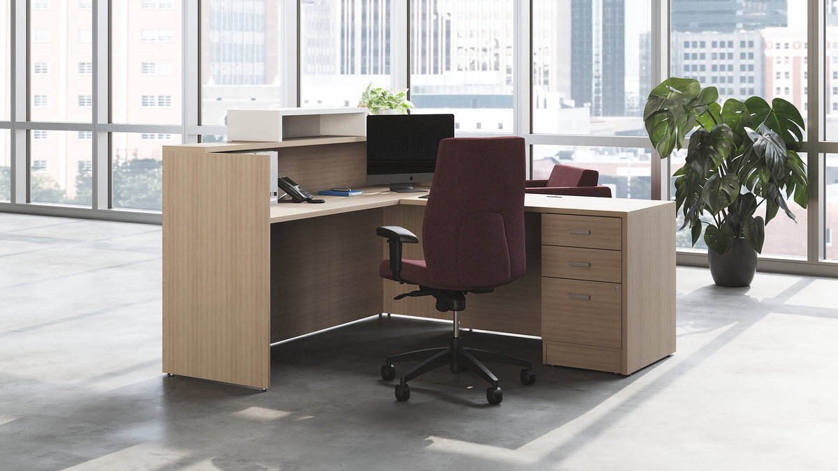 Offices To Go Newland Reception Desk — 72" – in a reception area